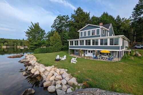 Stunning lakefront home with 270° water views and private beach near Acadia
