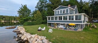 Stunning lakefront home with 270° water views and private beach near Acadia