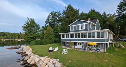 Stunning lakefront home with 270° water views and private beach near Acadia