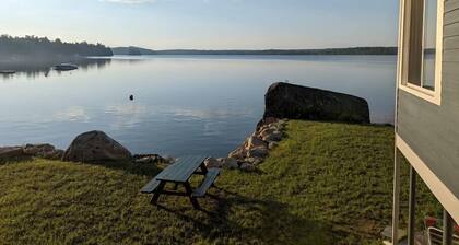 Stunning lakefront home with 270° water views and private beach near Acadia