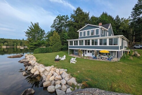Light-filled lakefront home for up to 15 with private beach and dock near Acadia