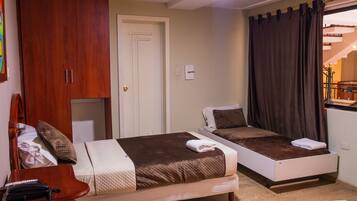 Habitación triple | Insonorización, tabla de planchar con plancha y wifi gratis