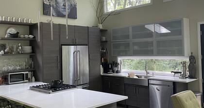 Private Wooded Acre, Soaring Windows in Nat’l Park, 2 blocks to the beach