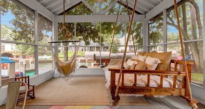 Waterfront Home on Lake Conroe with a private dock and covered boat lift.