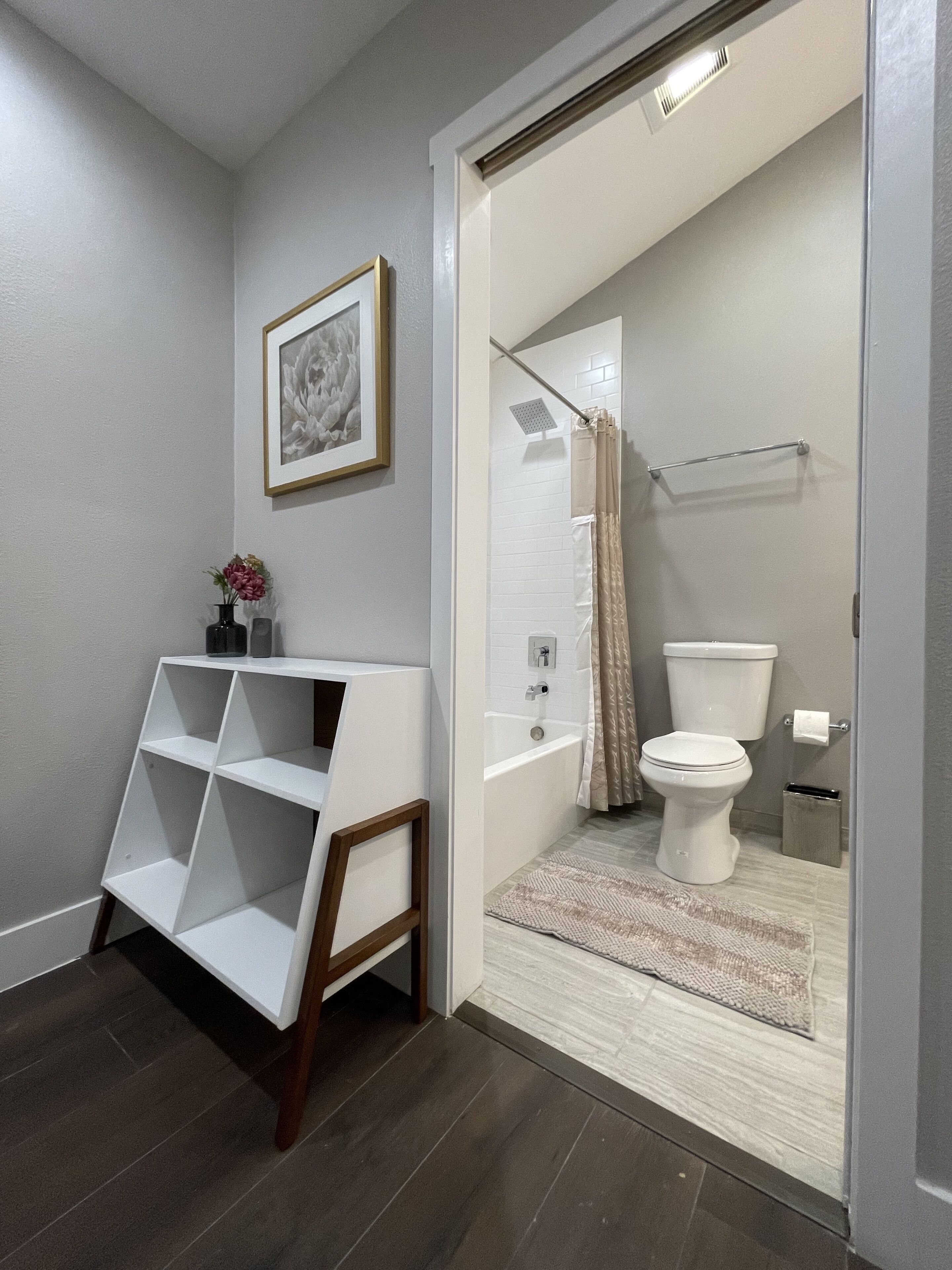 Combined shower/tub, hair dryer, towels, soap