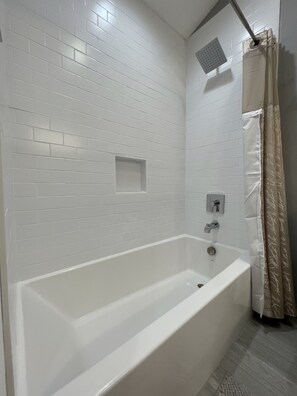 Combined shower/tub, hair dryer, towels, soap