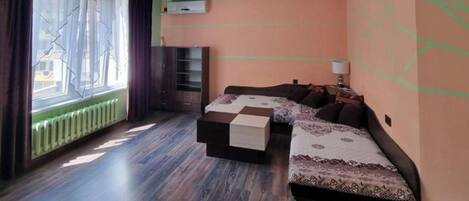 2 chambres, fer et planche à repasser, Wi-Fi, draps fournis