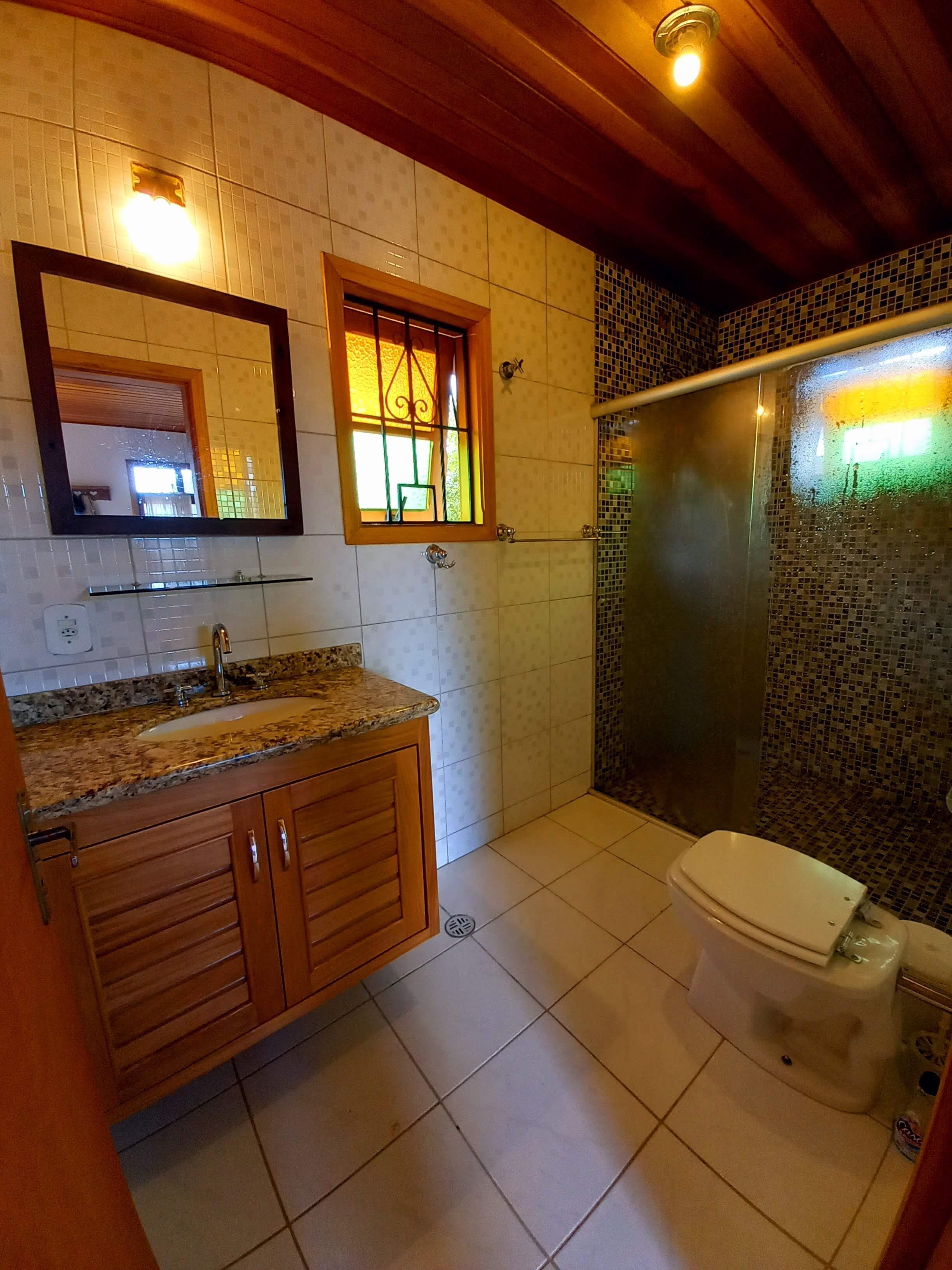 Shower, hair dryer, towels, toilet paper