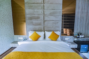 Suíte | Roupas de cama premium, frigobar, cofres nos quartos, escrivaninha