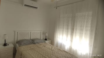 2 dormitorios, tabla de planchar con plancha, wifi gratis y ropa de cama