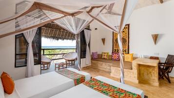 Deluxe Suite with Ocean View | Egyptian cotton sheets, premium bedding, minibar, in-room safe