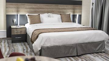 Standaard kamer | Een kluis op de kamer, verduisterende gordijnen, geluiddichte muren