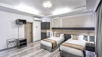 Family Room | In-room safe, blackout drapes, soundproofing, iron/ironing board