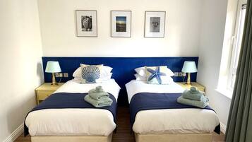 2 bedrooms, desk, iron/ironing board, travel cot