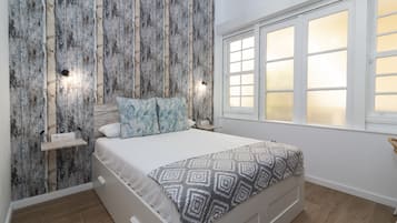 1 habitación, tabla de planchar con plancha, wifi gratis y ropa de cama