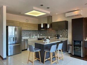 Fridge, microwave, dishwasher, coffee/tea maker