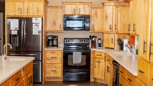 The kitchen has all the amenities you need to prepare a gourmet meal or a simple snack.