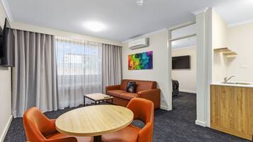 Apartment, 1 Bedroom (King) | Iron/ironing board, free WiFi, bed sheets