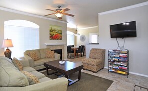 TV, fireplace, books, stereo