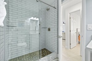 Combined shower/bathtub, hair dryer, towels - Blind Pass Condos at Bowman's Beach E104 on beautiful Sanibel Island (Sanibel)