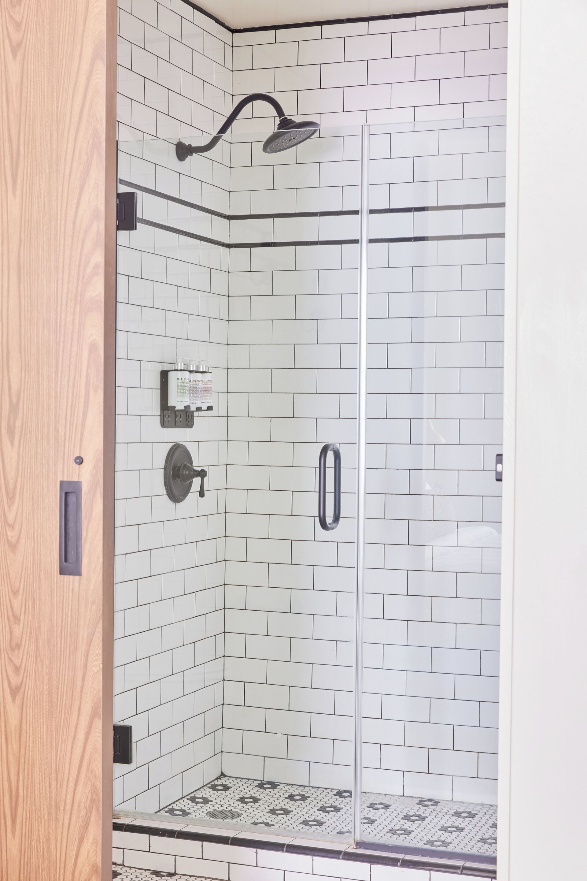 shower, designer toiletries, hair dryer, towels