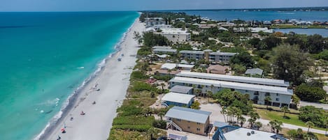 On the beach, sun loungers, beach towels