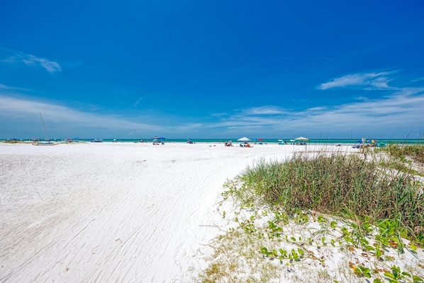 On the beach, sun-loungers, beach towels