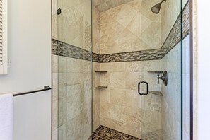 Shower, hair dryer, towels, soap