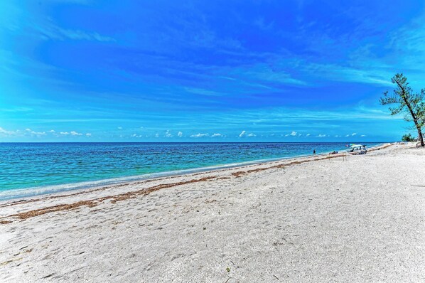 On the beach, sun-loungers, beach towels