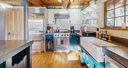 Luxury lakefront home with private hot tub, on-site dock, fireplace & HOA beach