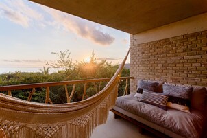 Seafront Senior Suite | Minibar, desk, laptop workspace, iron/ironing board