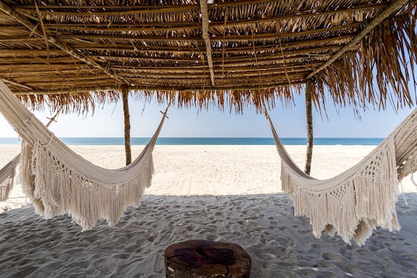 On the beach, beach umbrellas, beach towels