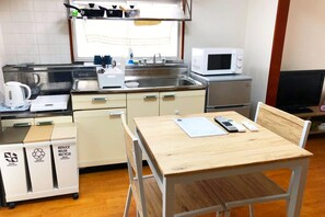 Fridge, microwave, cookware/dishes/utensils