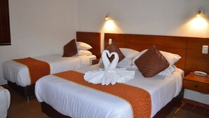 Quadruple Room, Garden View | In-room safe, blackout drapes, WiFi (free), bed sheets