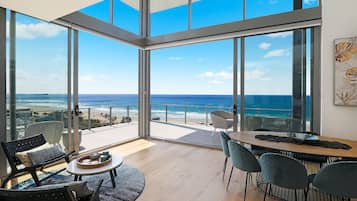 Penthouse, 4 Bedrooms | Living area | 42-inch TV with digital channels