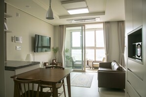 Deluxe Suite | Living area | 50-inch flat-screen TV with cable channels, TV - Landmark Stay in Songdo (Incheon)