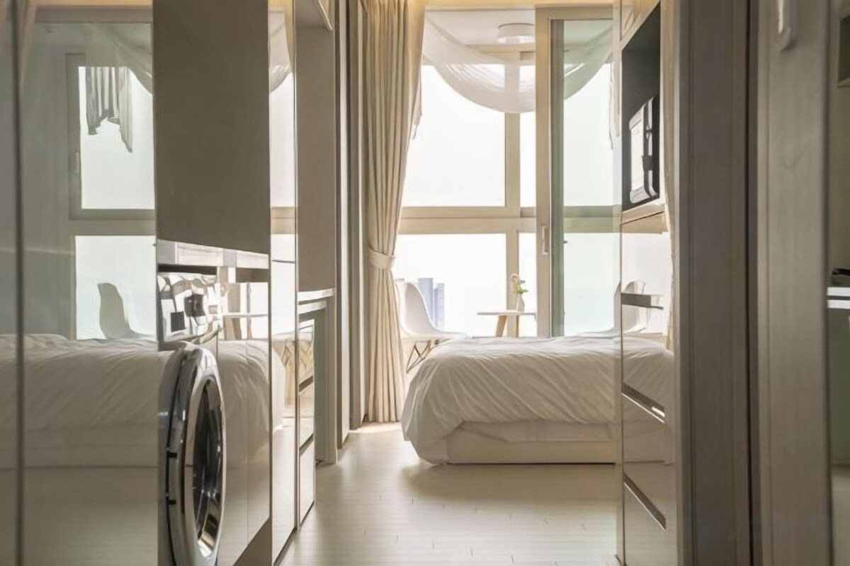 Down comforters, desk, blackout drapes, soundproofing