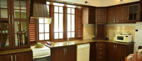 Oven, stovetop, dishwasher, coffee/tea maker