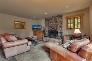 Flat-screen TV, fireplace, foosball