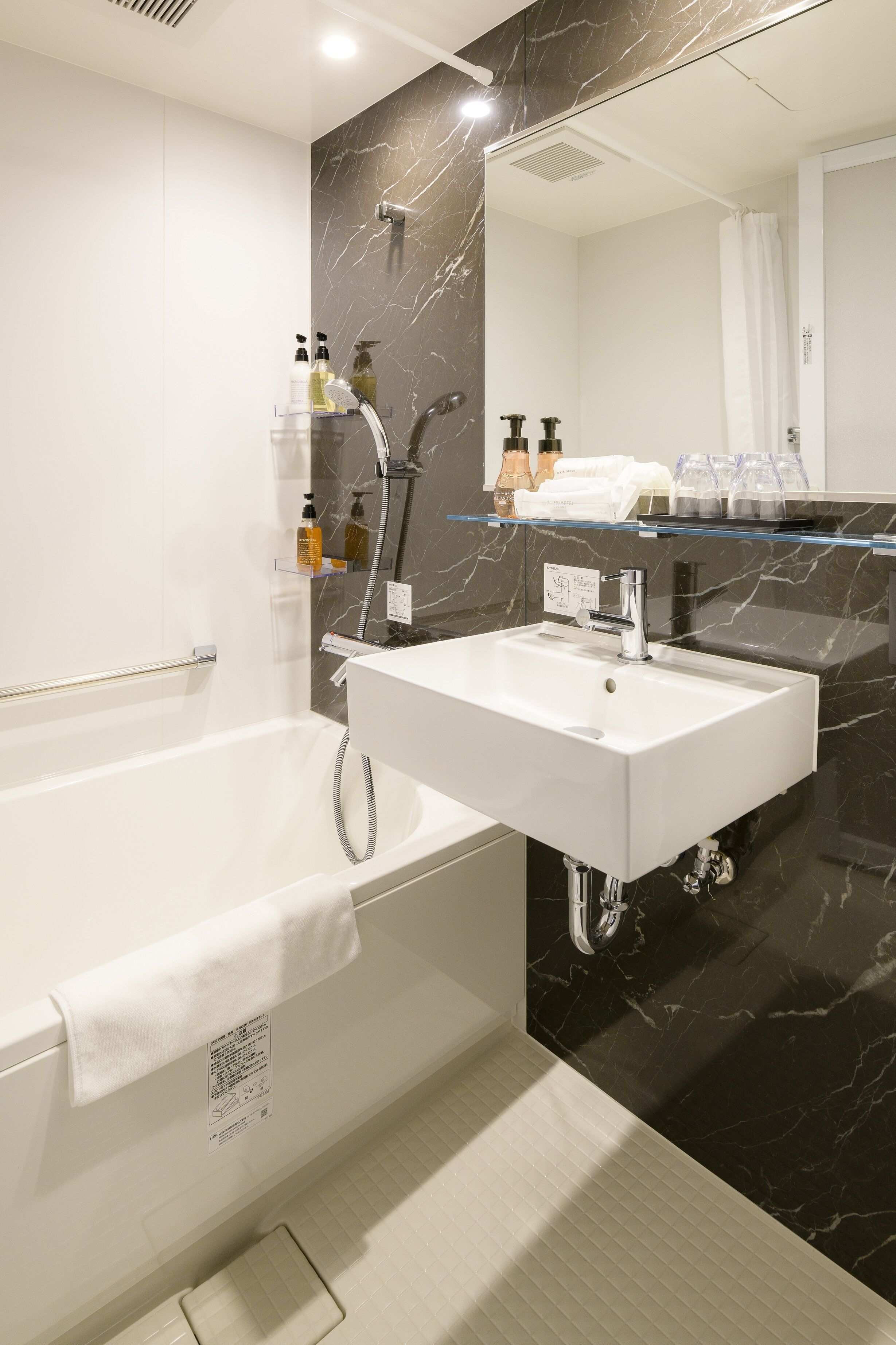 free toiletries, hair dryer, slippers, bidet