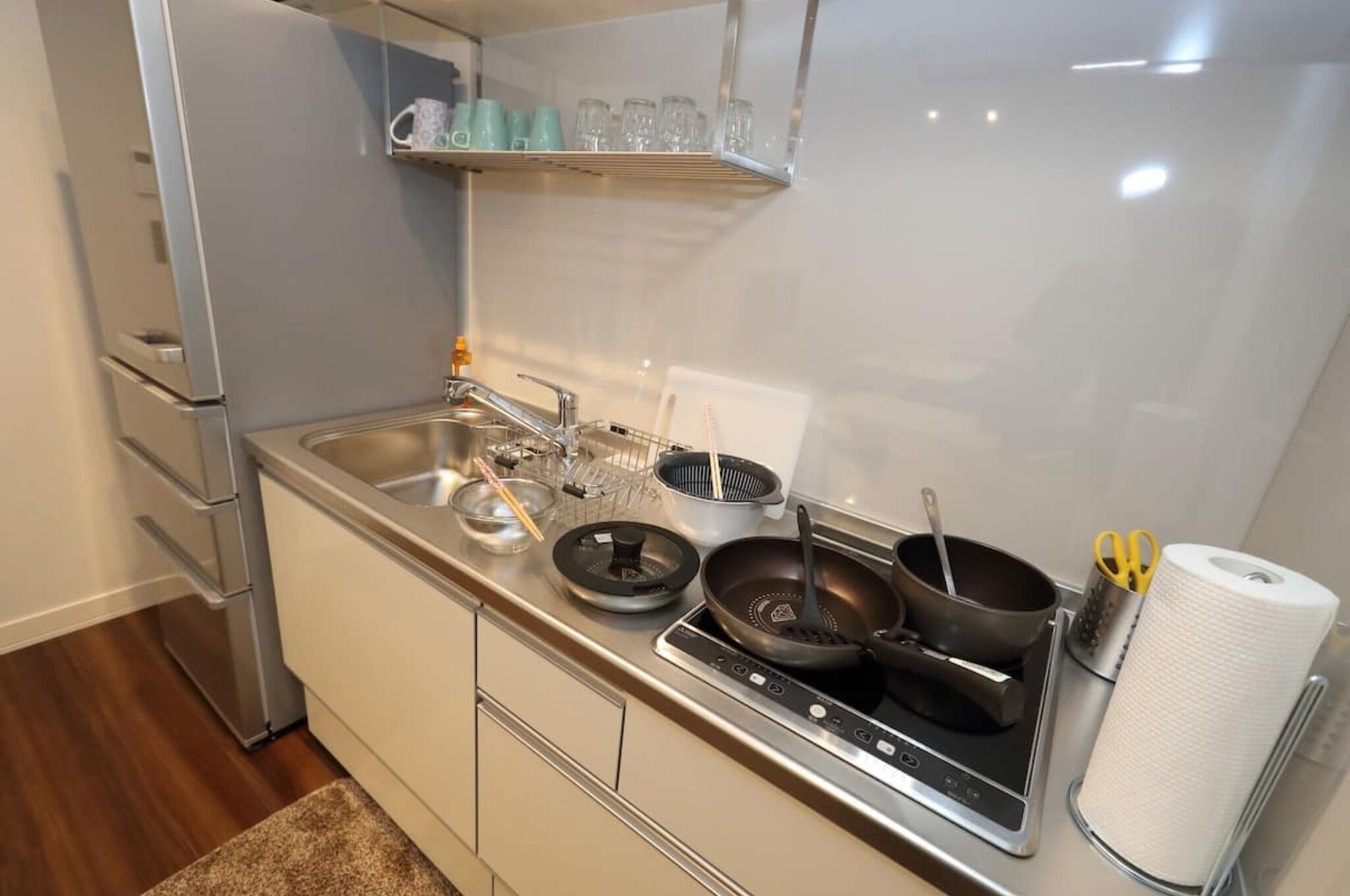 Fridge, microwave, stovetop, cookware/dishes/utensils