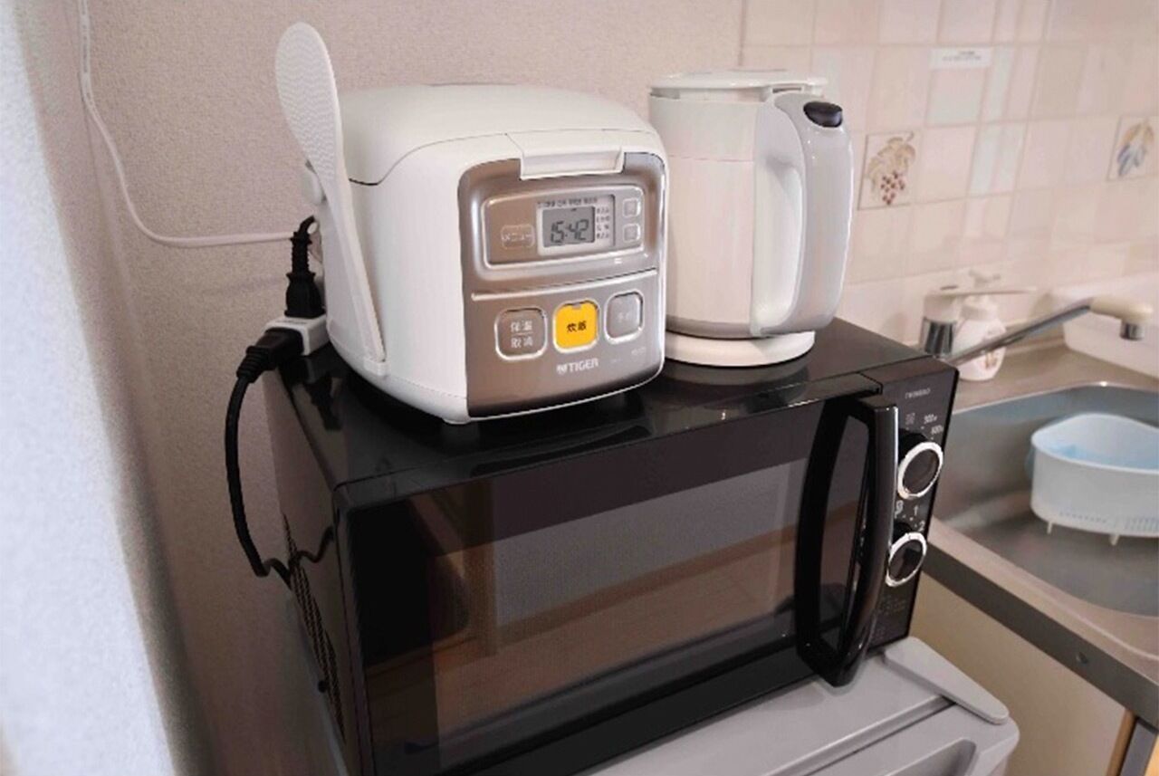 Fridge, microwave, cookware/dishes/utensils
