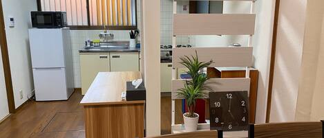 Fridge, microwave, stovetop, cookware/dishes/utensils