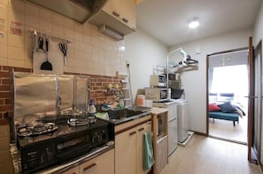 Fridge, microwave, stovetop, cookware/dishes/utensils