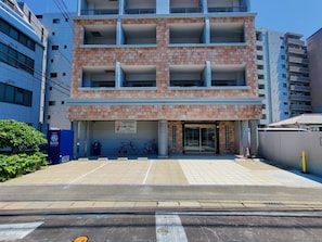 Guests can park their bicycles outside this building, which offers easy access to the surrounding area.