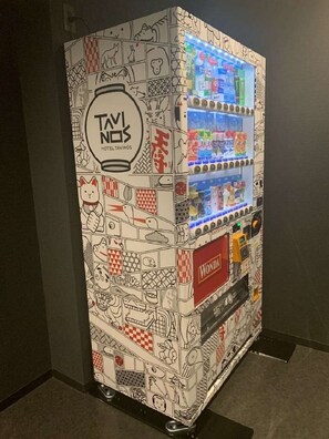 A vending machine with a unique design featuring various illustrations and the logo 'TAVIOS HOTEL'. - Non smoking Double Room / Kyoto Kyōto (Kyoto)