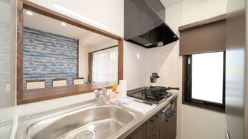 Fridge, microwave, stovetop, cookware/dishes/utensils