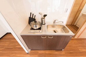 Fridge, microwave, cookware/dishes/utensils