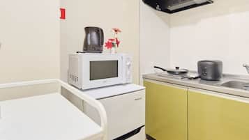 Fridge, microwave, cookware/dishes/utensils