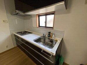 Fridge, microwave, stovetop, cookware/dishes/utensils